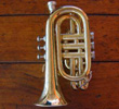 trompete pocket x 100 A história dos instrumentos